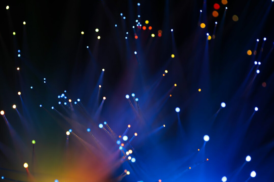 Glowing network connections over a globe