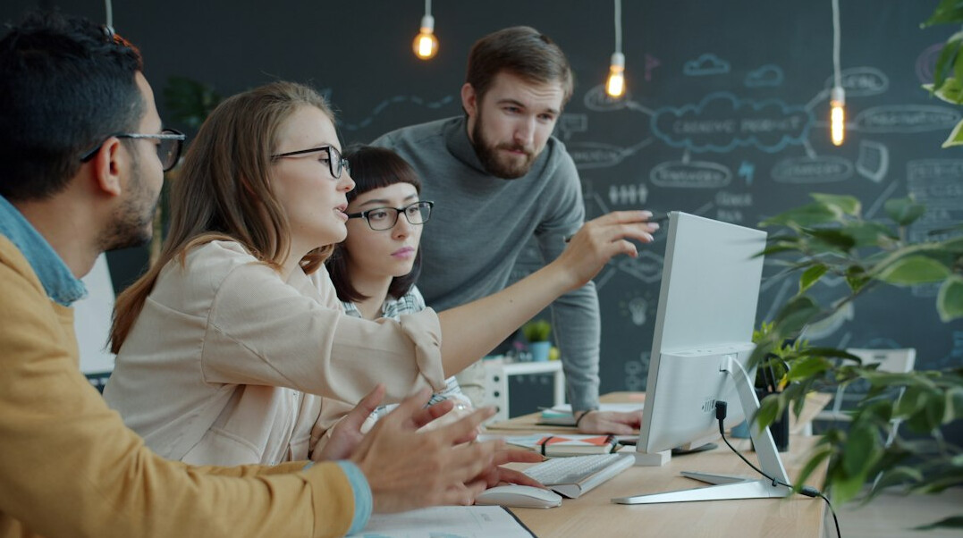 team of developers coding together