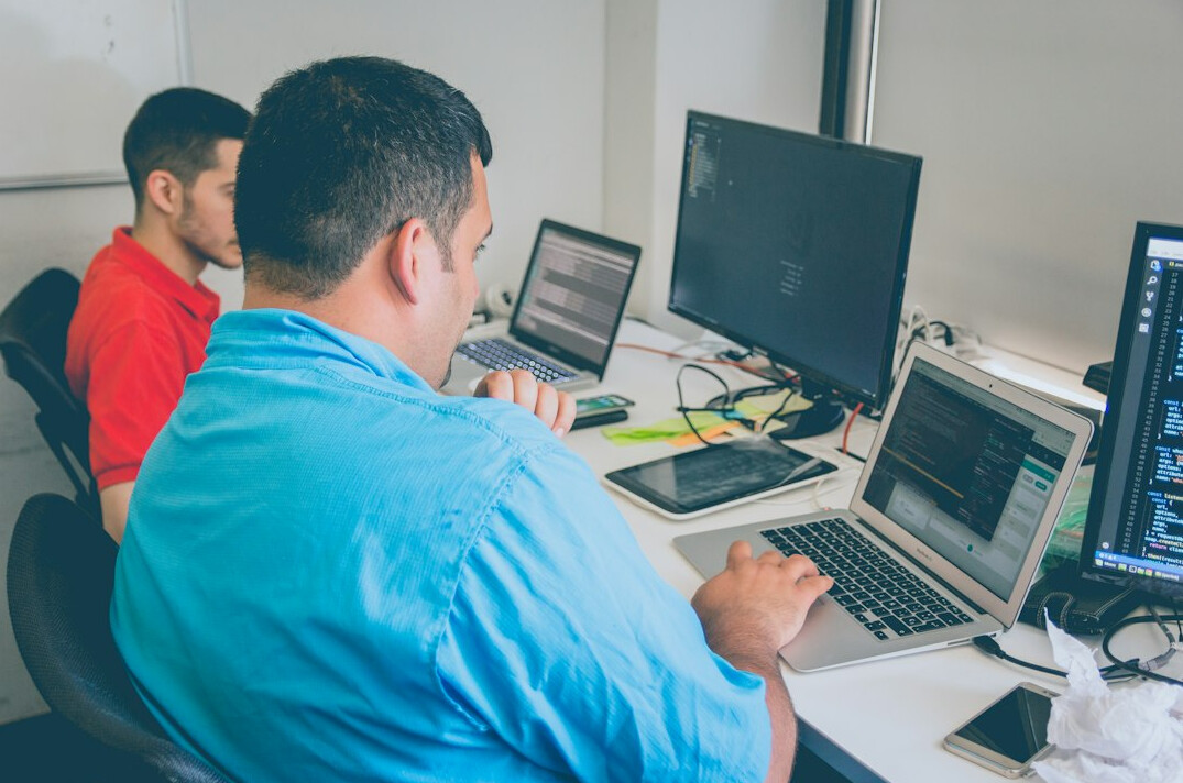 team of programmers collaborating